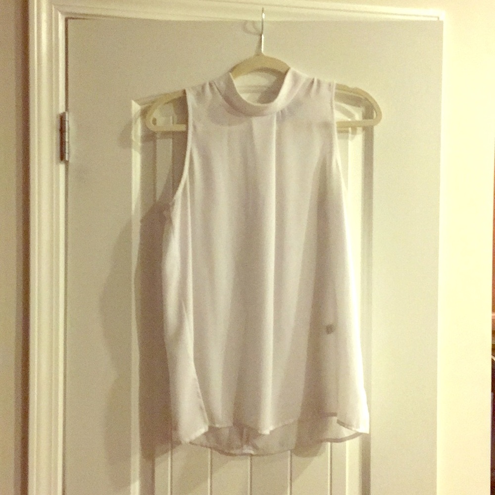 White sleeveless blouse